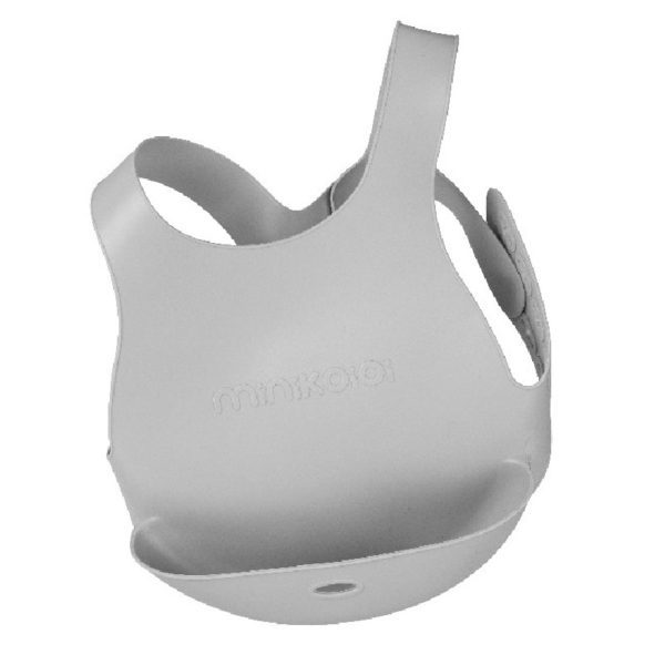 Bavoir avec système d'attache au dos de marque Minikoioi en silicone pour bébés dès 6 mois et toute l’enfance. Souple et facilement transportable